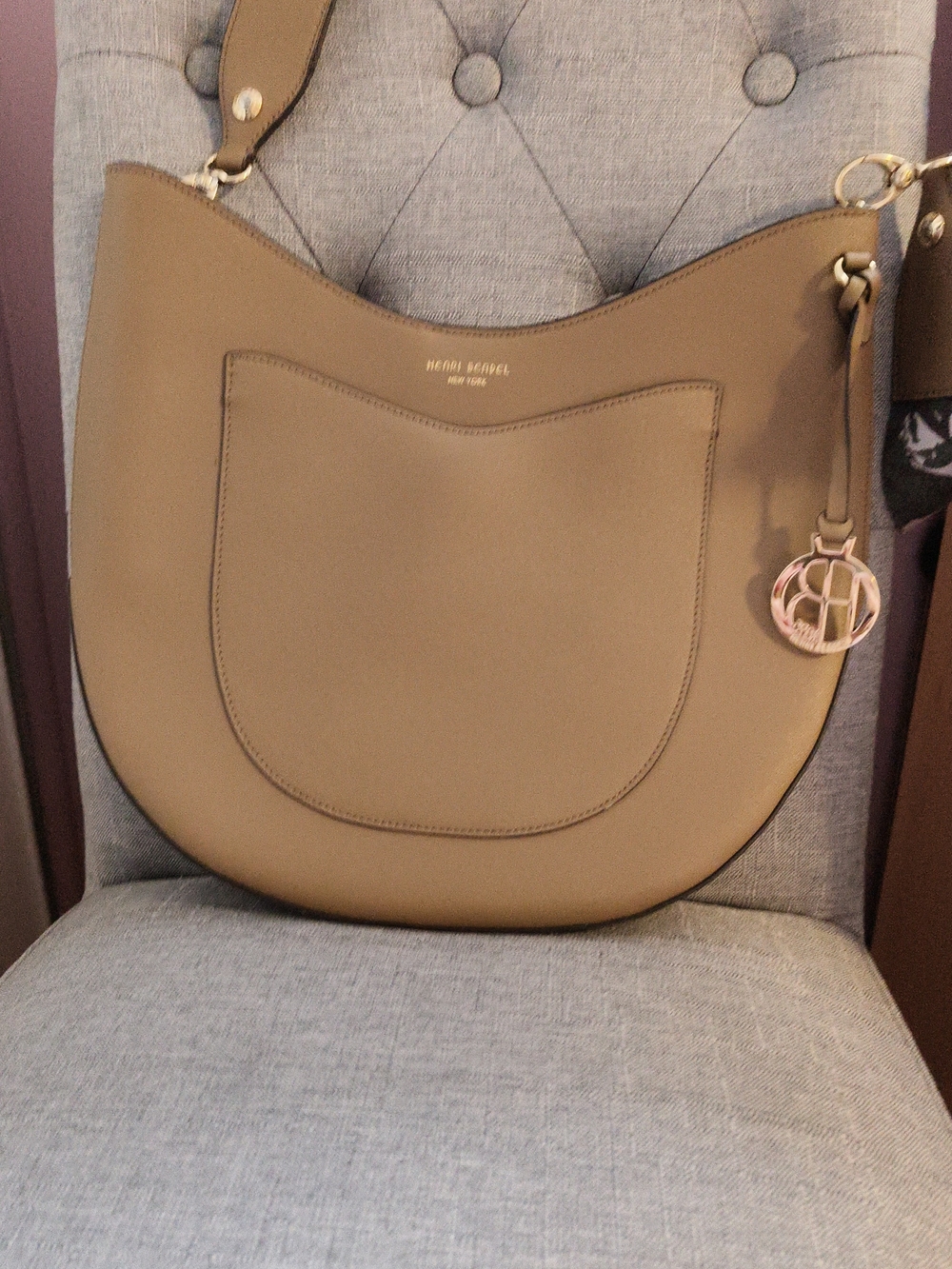Henri Bendel Saddle Crossbody Bag in Taupe